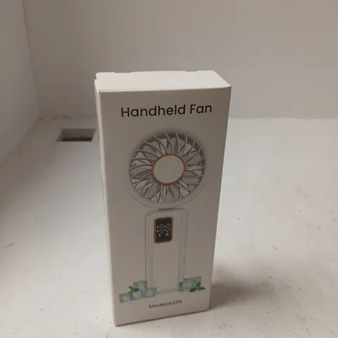 APPROXIMATELY 10 ASSORTED ITEMS INCLUDING HANDHELD FAN AND WIRELESS SPEAKER