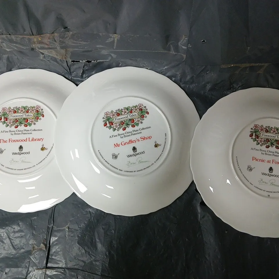 3 WEDGWOOD FOXWOOD TALES A FINE BONE CHINA 21CM PLATE BY BRAIN PATERSON TO INCLUDE PICNIC AT FOXWOOD, MR GRUFFEY'S SHOP, THE FOXWOOD LIBRARY