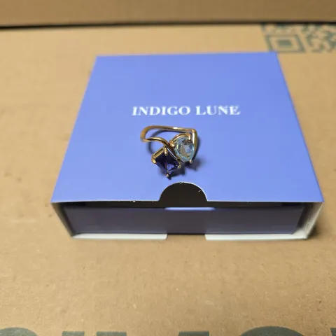 INDIGO LUNE RING WITH TWO BLUE GEMSTONES, GOLD-TONE BAND