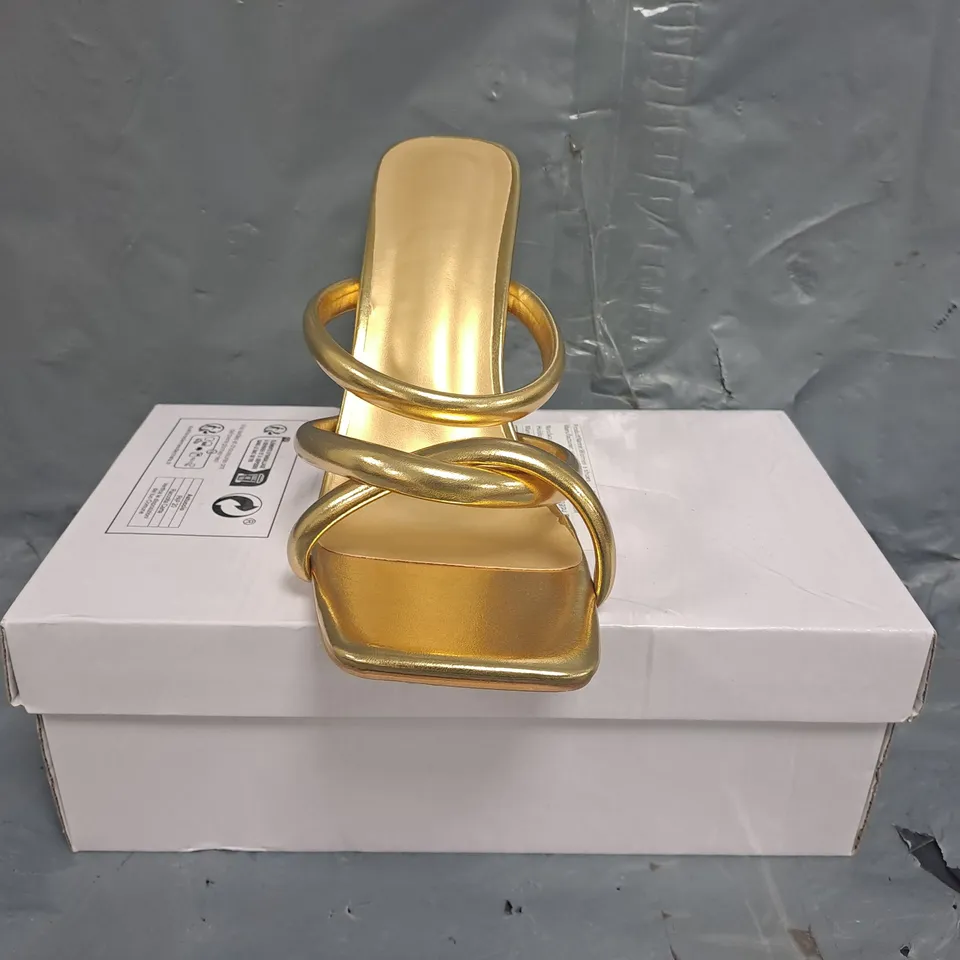 BOXED PAIR OF UNBRANDED OPEN TOE STILETTO HEEL SANDALS IN METALLIC GOLD SIZE EU 41