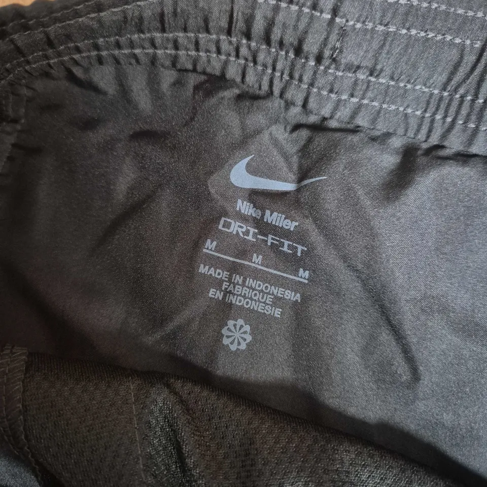 NIKE MILER 9" LENGTH SHORTS IN BLACK - MEDIUM
