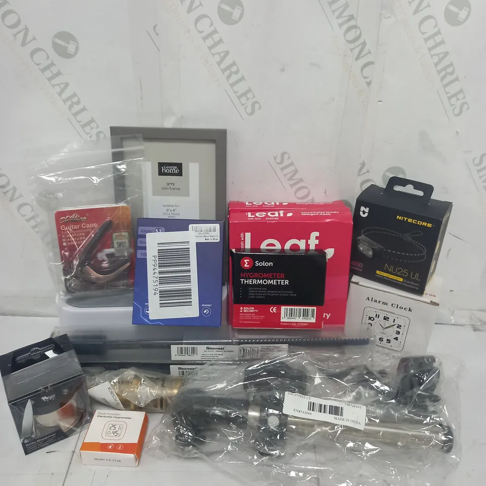 APPROXIMATELY 10 ASSORTED HOUSEHOLD GOODS TO INCLUDE NITECORE HEADLAMP, ALICE GUITAR CAPO, LEAF LAUNDRY DETERGENT SHEETS ETC. 