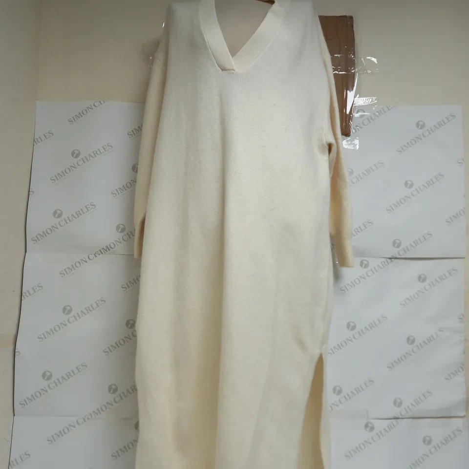H&M OVERSIZED CARDIGAN IN CREAM - US MEDIUM
