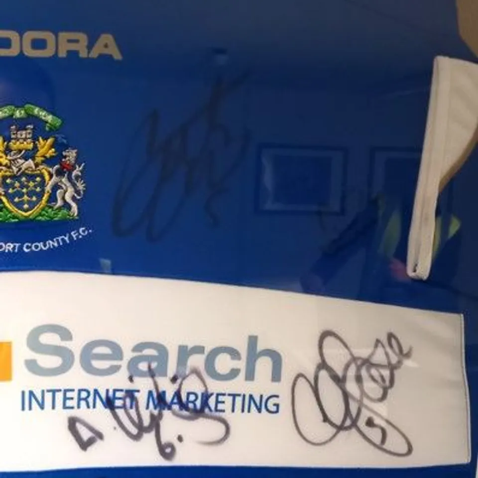FRAMED, MOUNTED AND SIGNED STOCKPORT COUNTY FC HOME JERSEY