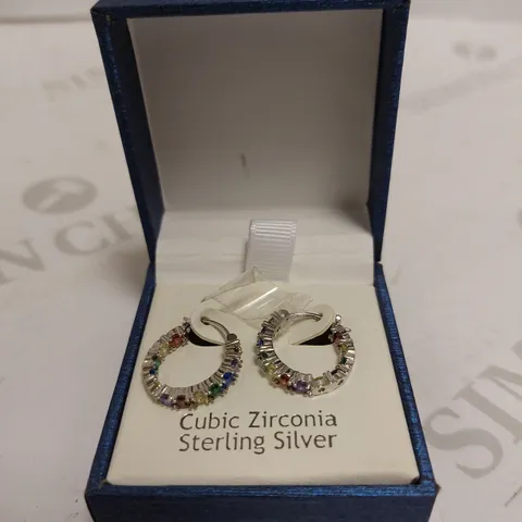 NANETTE LEPORE SILVER LOOP EARRINGS