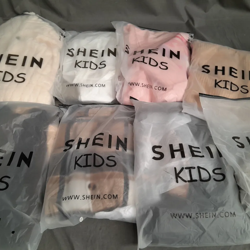 LOT OF APPROXIMATELY 23 ASSORTED BAGGED SHEIN KIDS CLOTHING ITEMS - VARIOUS SIZES