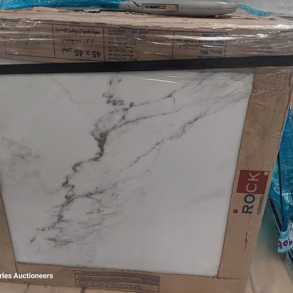 PALLET OF 7 PACKS OF CALACATA SPANISH TILES EACH 45 × 45cm total 10.1sq m