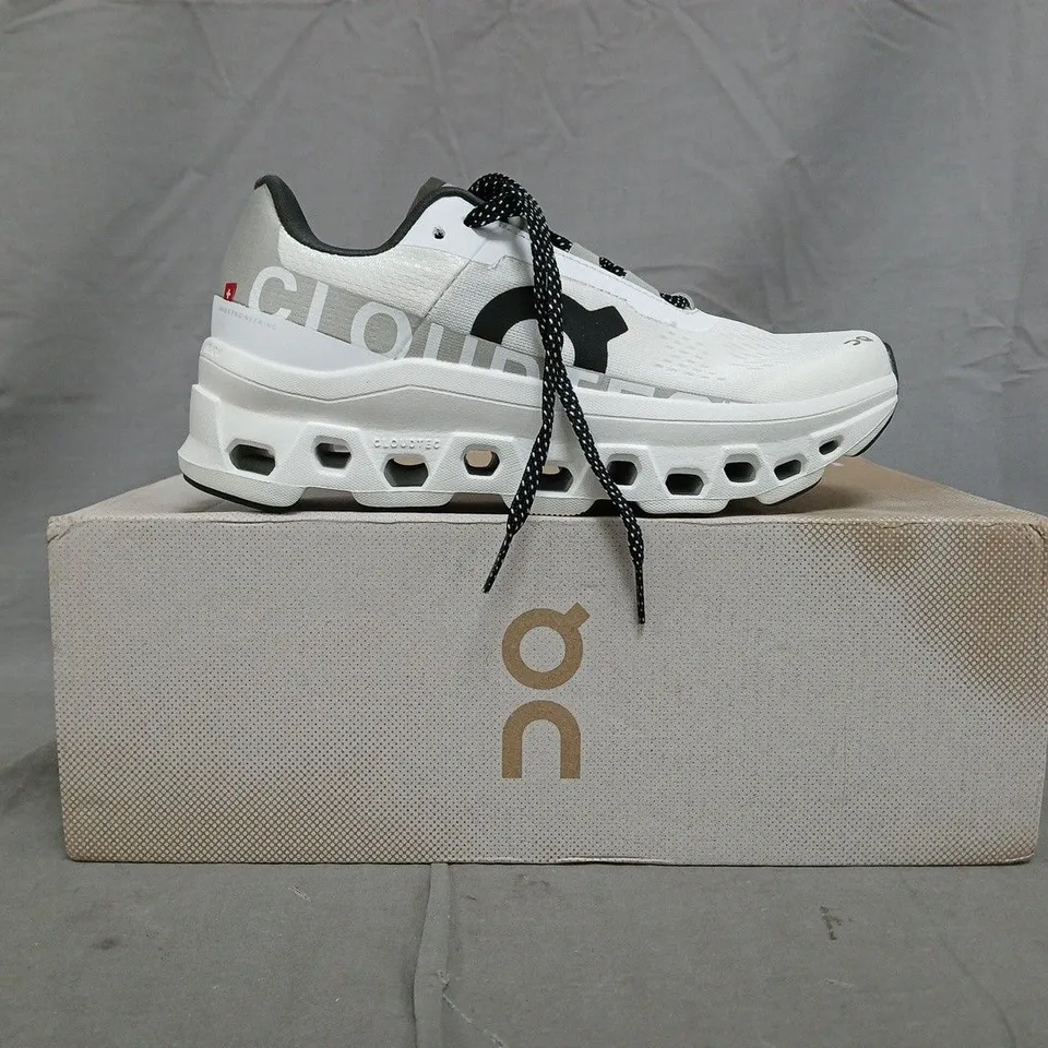 BOXED PAIR OF ON CLOUDMONSTER SHOES IN WHITE SIZE UK 4
