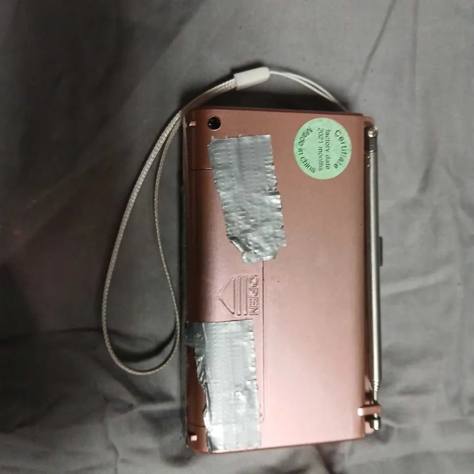 ROSE GOLD PORTABLE RADIO WITH NUMERIC KEYPAD AND LCD DISPLAY-