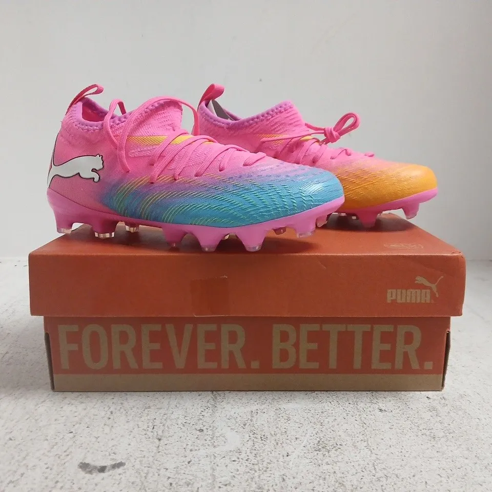 BOXED PAIR OF PUMA KIDS FUTURE 9 MATCH FOOTBALL BOOTS IN PINK/BLUE/ORANGE SIZE UK 1