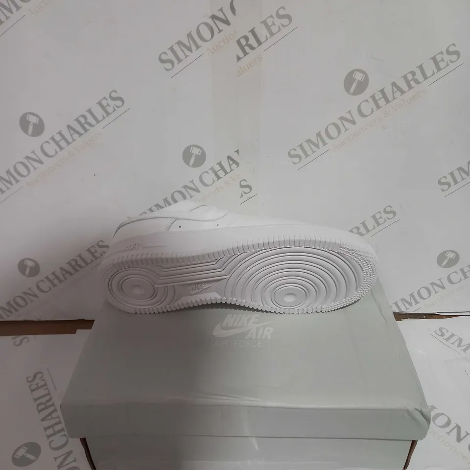BOXED PAIR OF NIKE WHITE AIR FORCE ONES SIZE 4.5