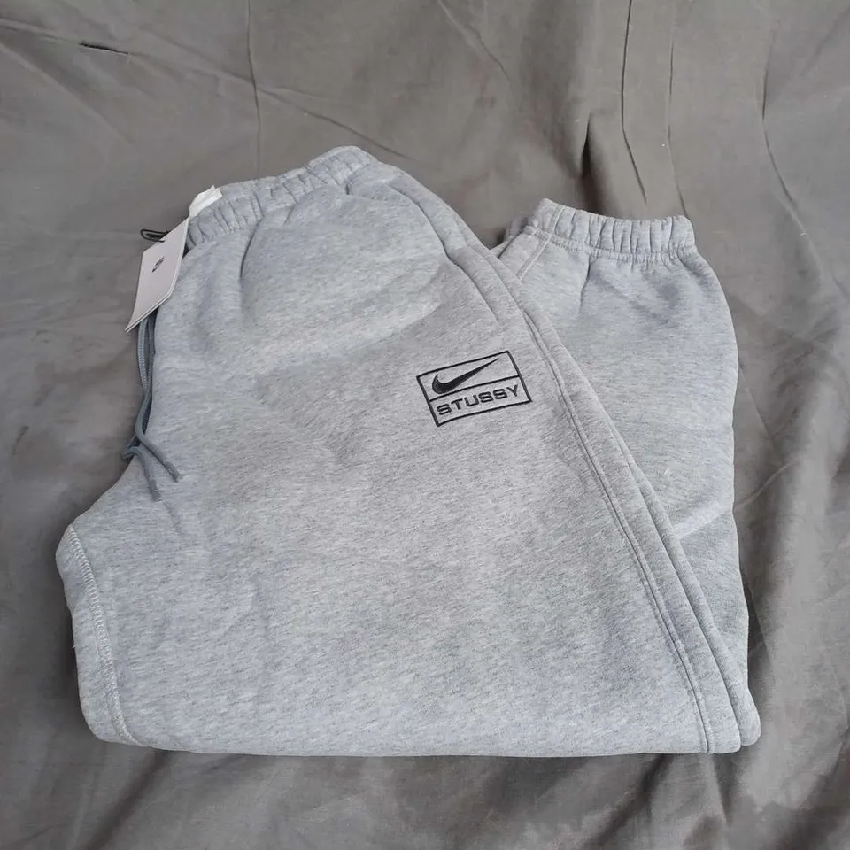 NIKE STUSSY CASUAL UNISEX SWEATPANTS IN GREY SIZE S