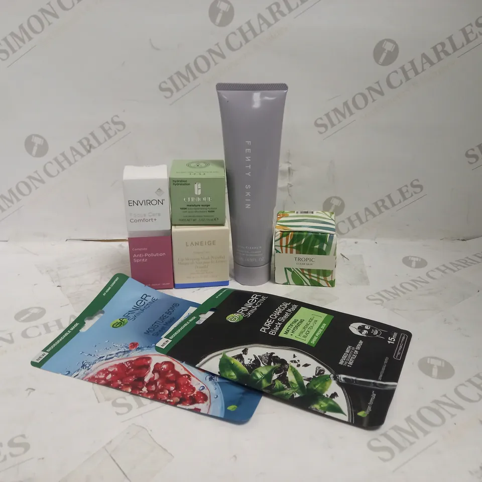 LOT OF 7 DESIGNER SKINCARE ITEMS, TO INCLUDE FENTY, CLINIQUE, LANEIGE, TROPIC, ENVIRON & GARNIER