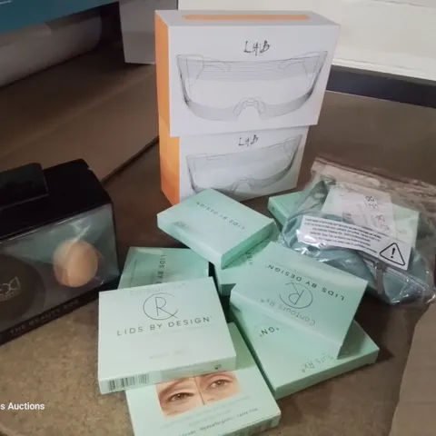 BOX OF ASSORTED MAKE UP ITEMS, INCLUDING, LIQUID FOUNDATION, EYELID CORRECTING STRIPS, 2 Γ ANTI AGING EYE MASKS