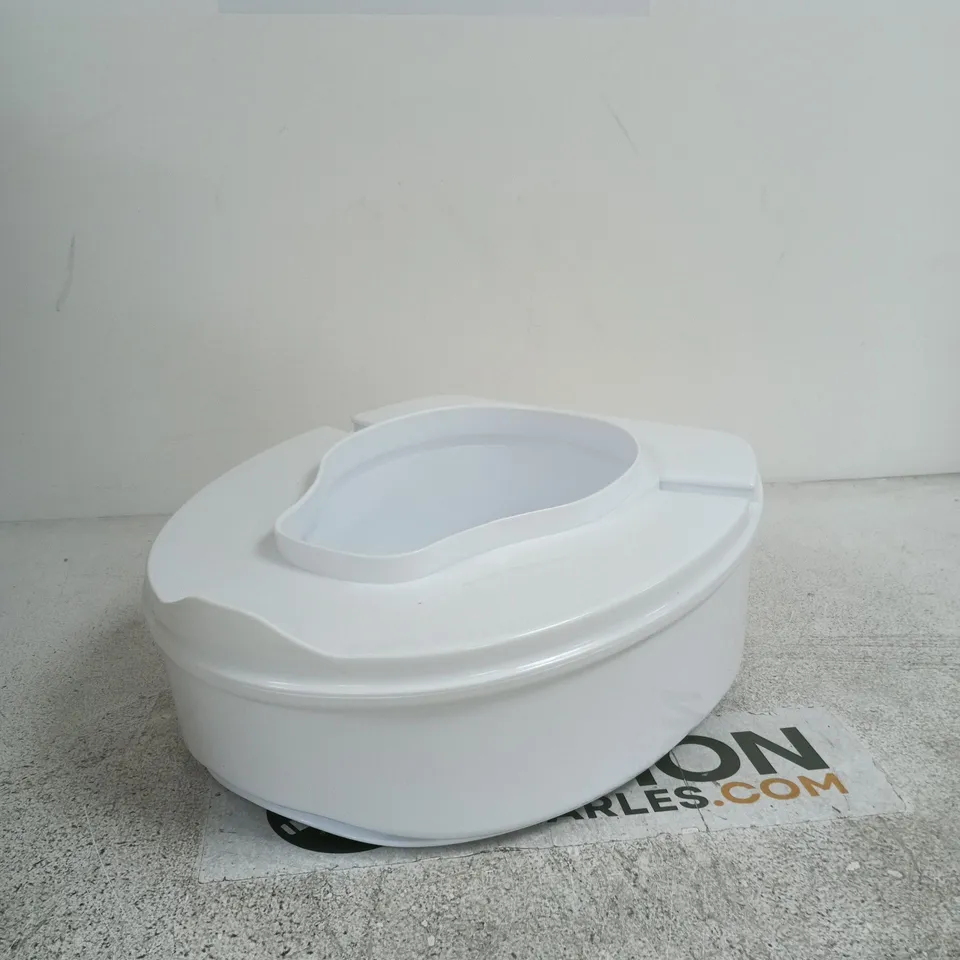 RAISED TOILET SEAT RISER – WHITE PLASTIC WITH INSTRUCTION SHEET