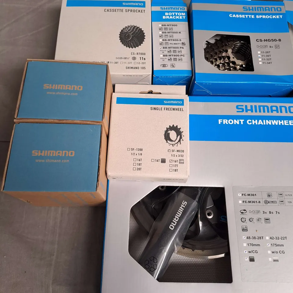 LOT OF 13 ASSORTED SHIMANO CYCLING PARTS TO INCLUDE CASSETTE SPROCKET, SINGLE FREEWHEEL AND FRONT CHAINWHEEL