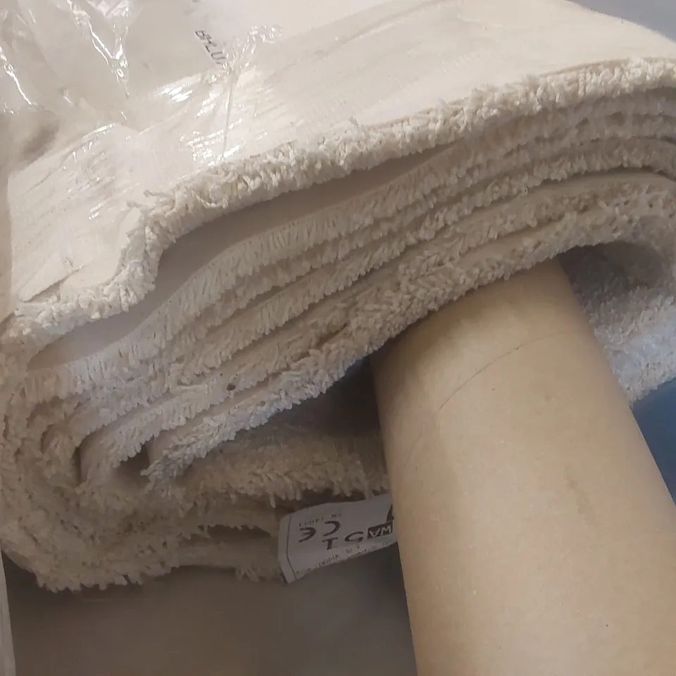 ROLL OF QUALITY MAGICAL FEELING WHITE IVORY CARPET - APPROXIMATELY 5.75 x 5m