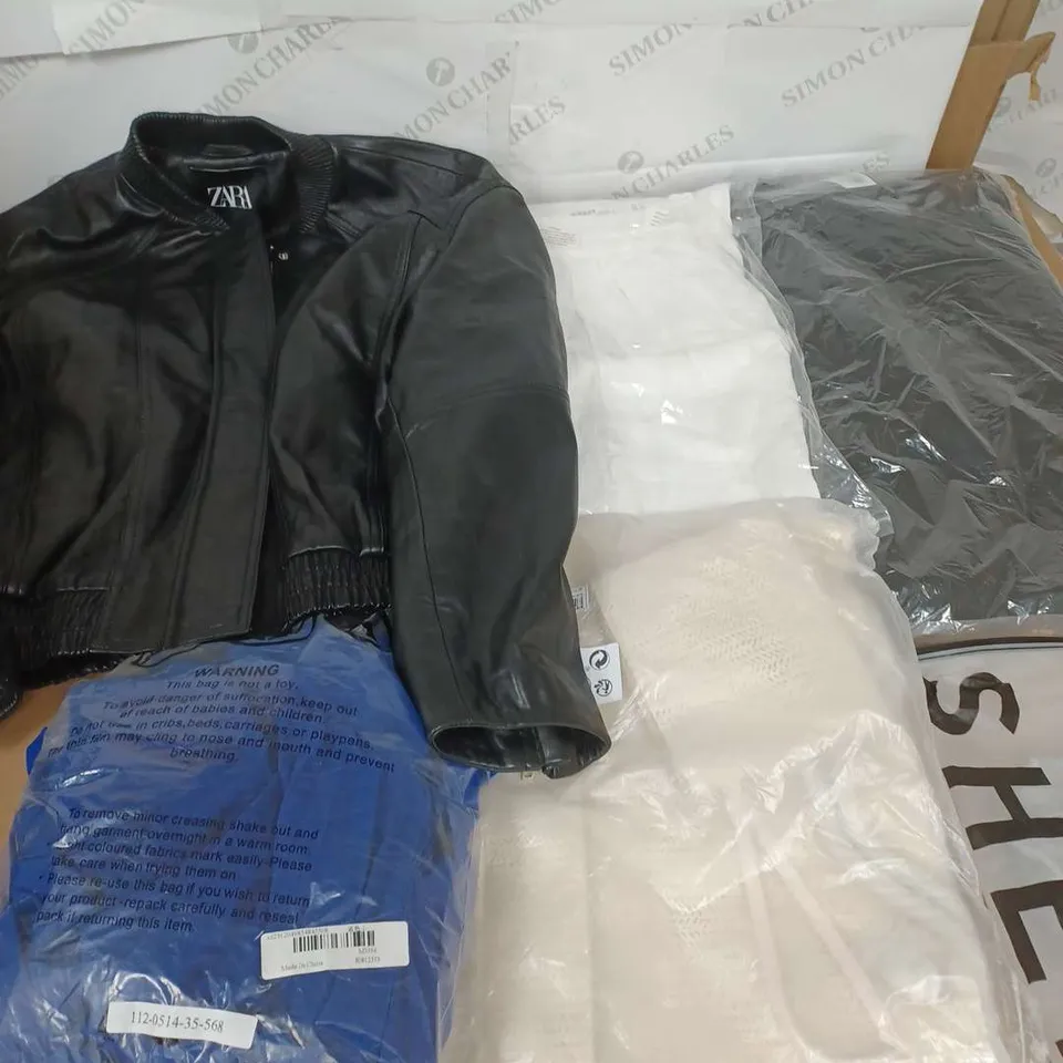 LARGE QAUNTIITY OF ASSORTED CLOTHING ITEMS TO INCLUDE JACKETS, TOPS, SKIRTS, ETC