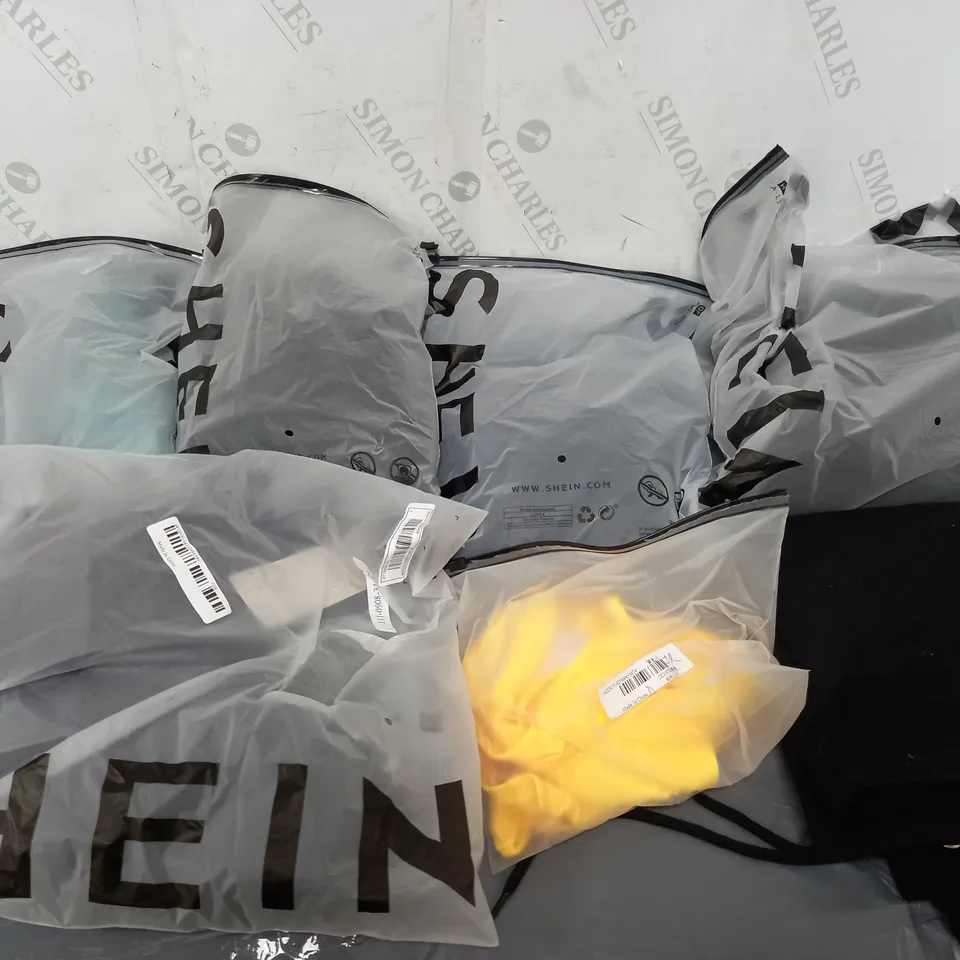 LARGE BOX OF ASSORTED CLOTHING ITEMS TO INCLUDE TROUSERS, JUMPERS AND DRESSES