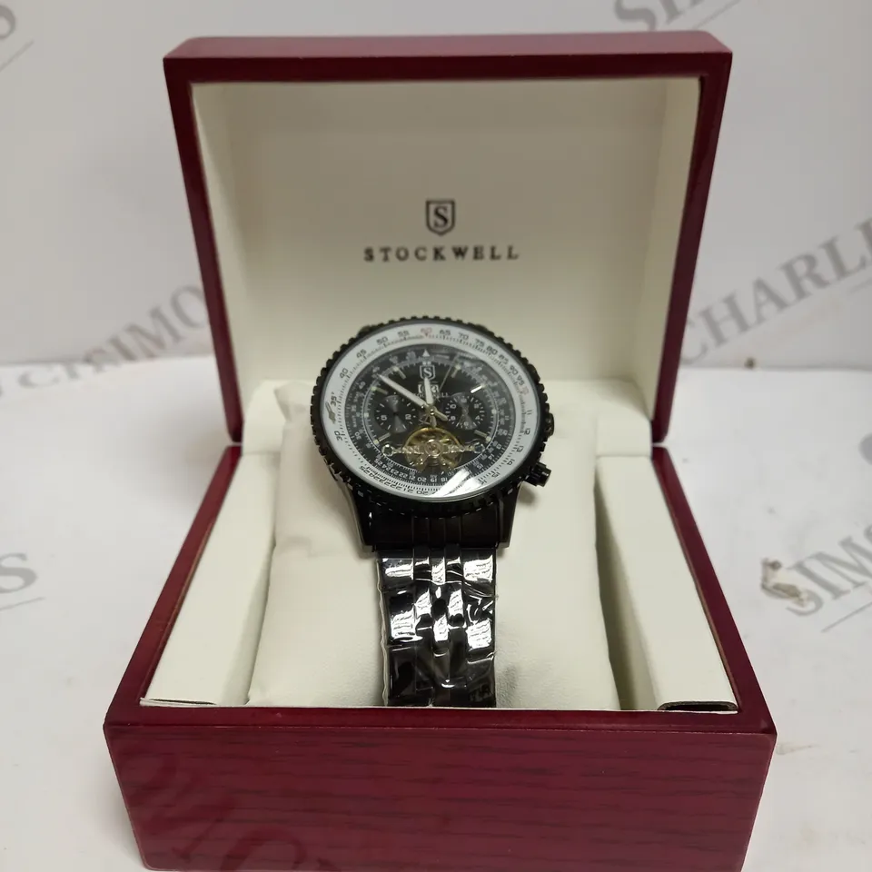 MENS STOCKWELL AUTOMATIC TOURBILLON WATCH – DOUBLE DATE – GLASS EXHIBITION BACK CASE – STAINLESS STEEL STRAP