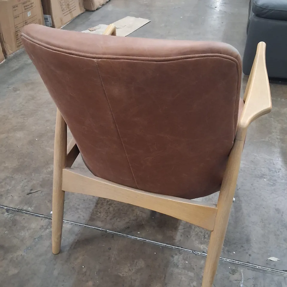 UNBOXED CARRERA ARMCHAIR IN BROWN