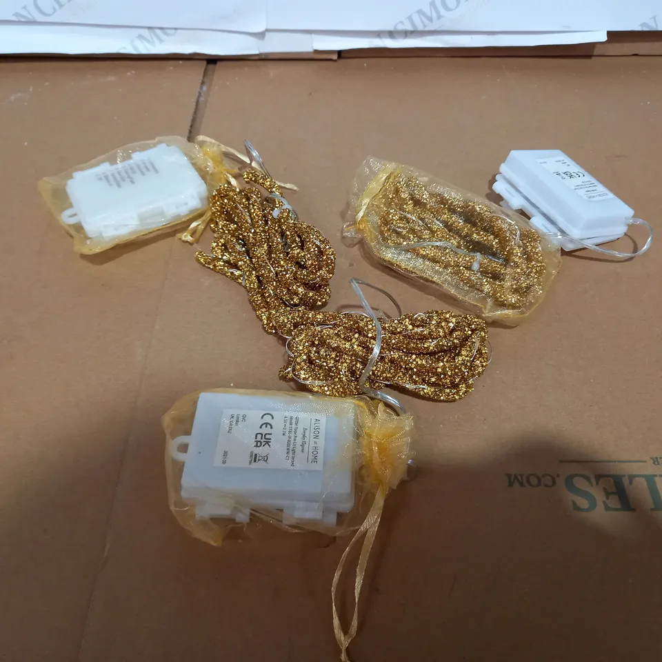 ALISON CORK SET OF PRE-LIT GLITTER ROPE STRANDS - GOLD