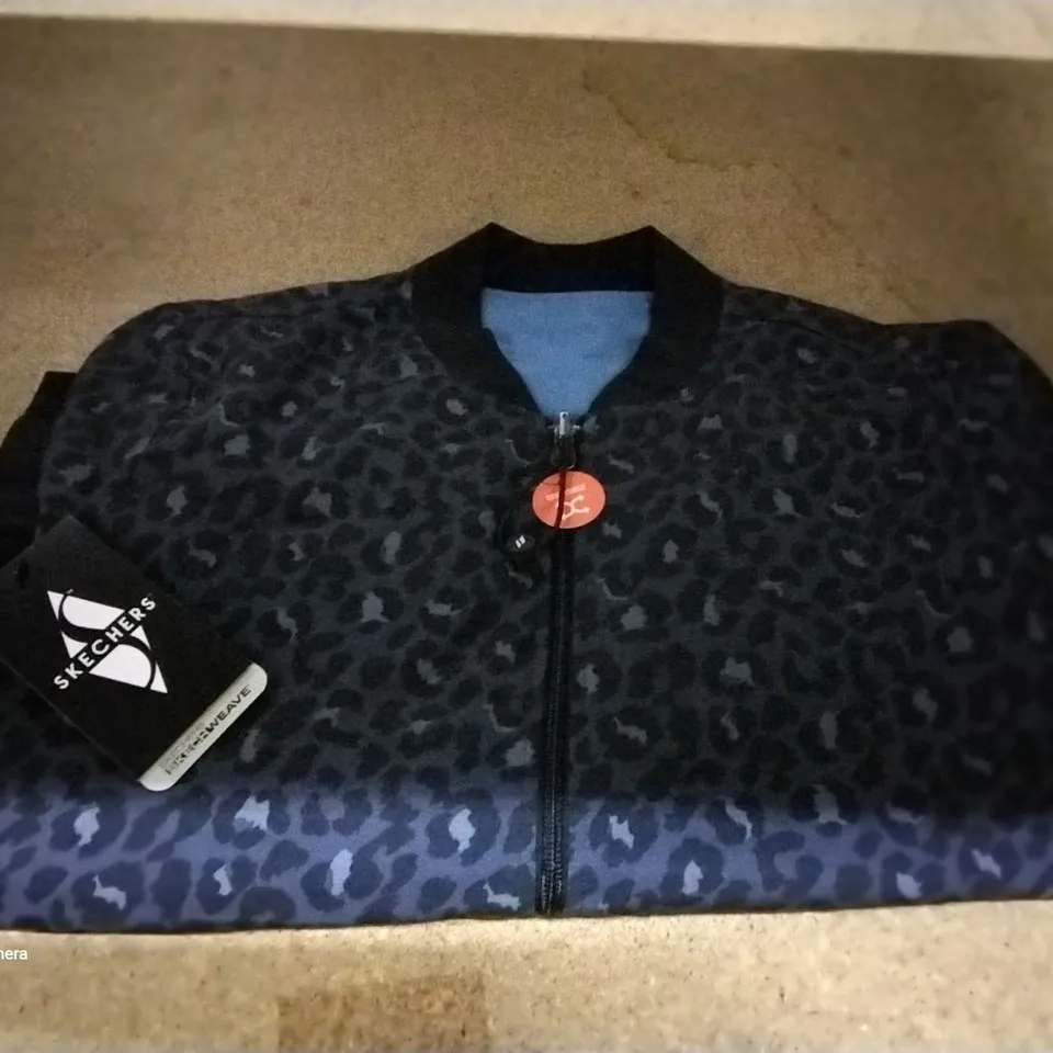 BOX OF APPROXIMATELY 14 BRAND NEW SKECHERS MIDNIGHT LEOPARD REVERSIBLE JACKETS VARIOUS SIZES