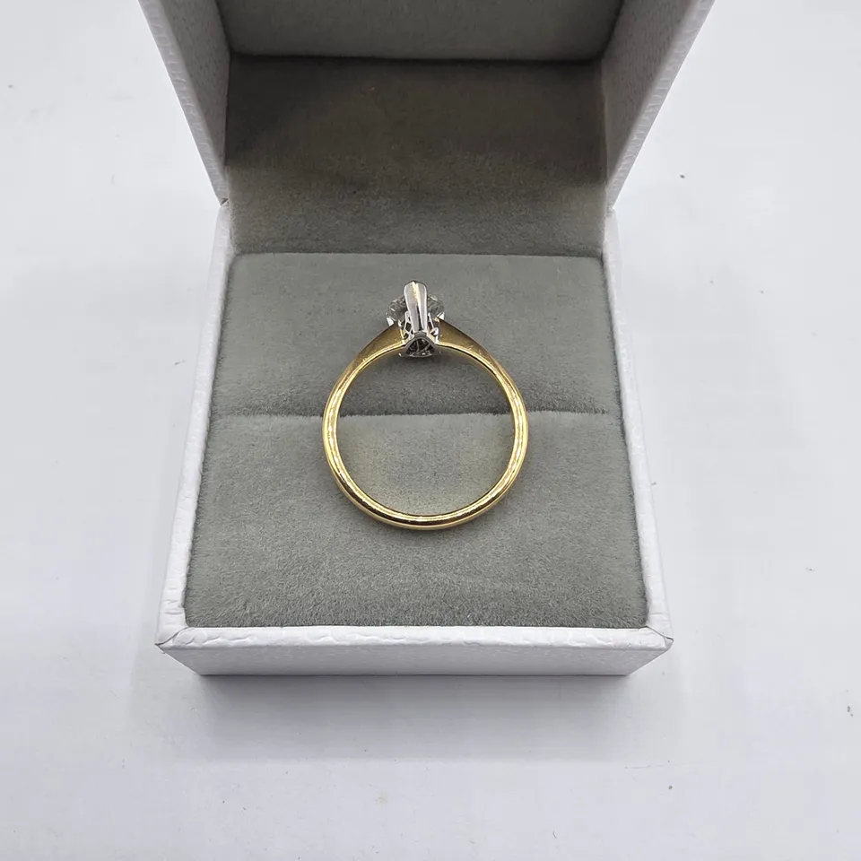 18CT GOLD SOLITARE RING SET WITH A NATURAL PEAR SHAPE DIAMOND WEIGHING +-1.07CT