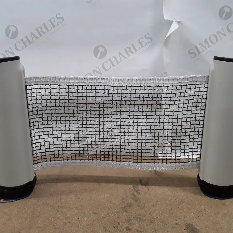 BOX CONTAINING APPROXIMATELY 21 TABLE TENNIS NETS
