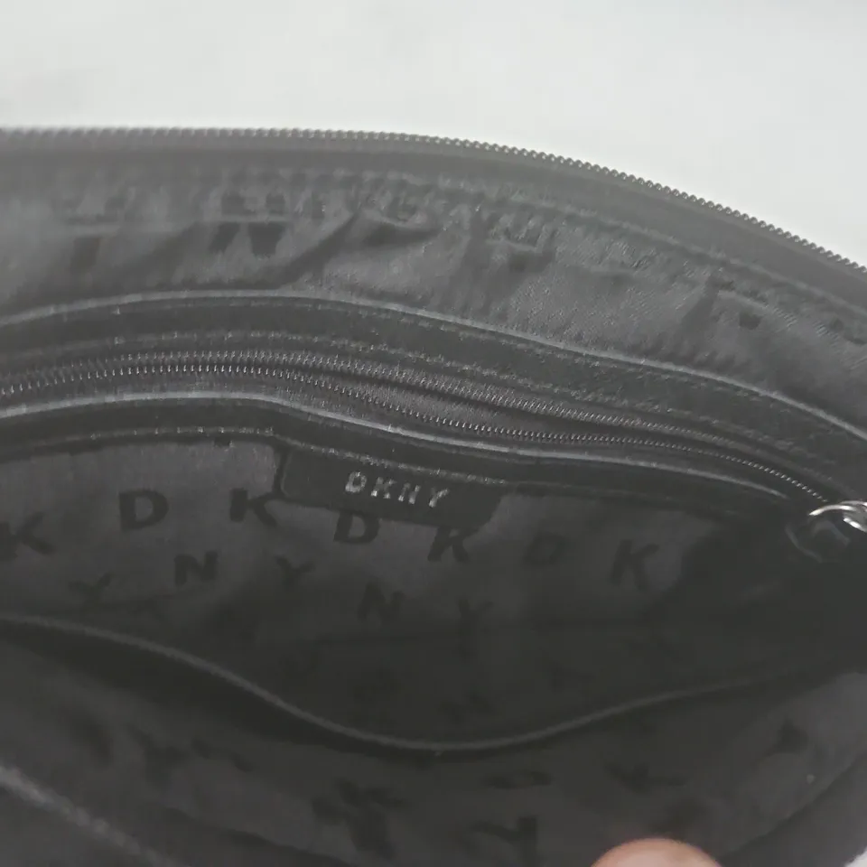 DKNY BLACK MINI BACKPACK WITH FRONT ZIP POCKET