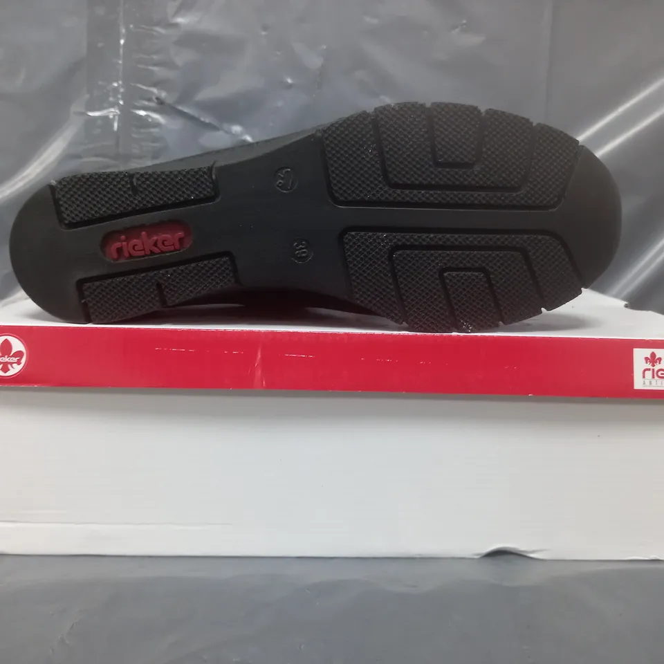 BOXED PAIR OF RIEKER WEDGE TRAINERS IN BLACK SIZE 6