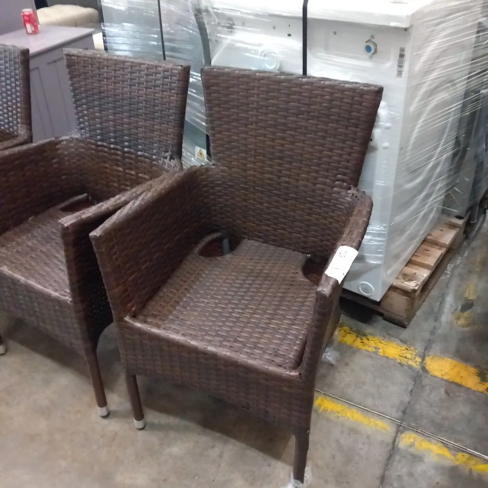 FOUR RATTAN EFFECT GARDEN STACKING CHAIRS