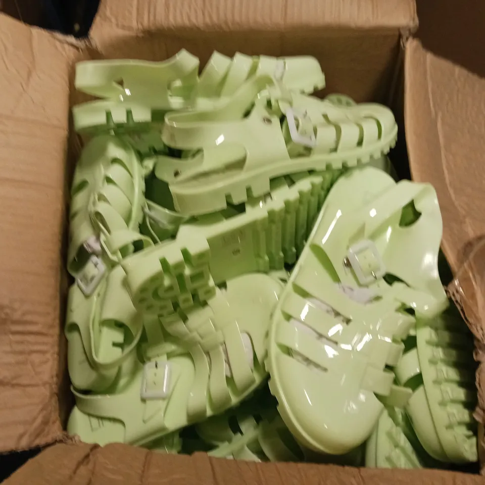 LOT OF APPROXIMATELY 12 PAIRS OF LINZI GREEN PLASTIC SANDALS - VARIOUS SIZES