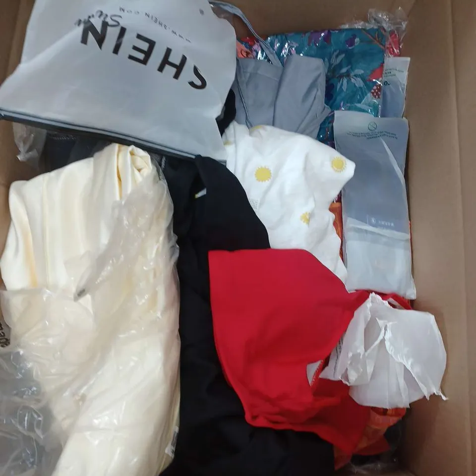 BOX OF APPROXIMATELY 22 ASSORTED CLOTHING ITEMS TO INCLUDE - SOCKS , DRESS , BIKINI PANTS ETC