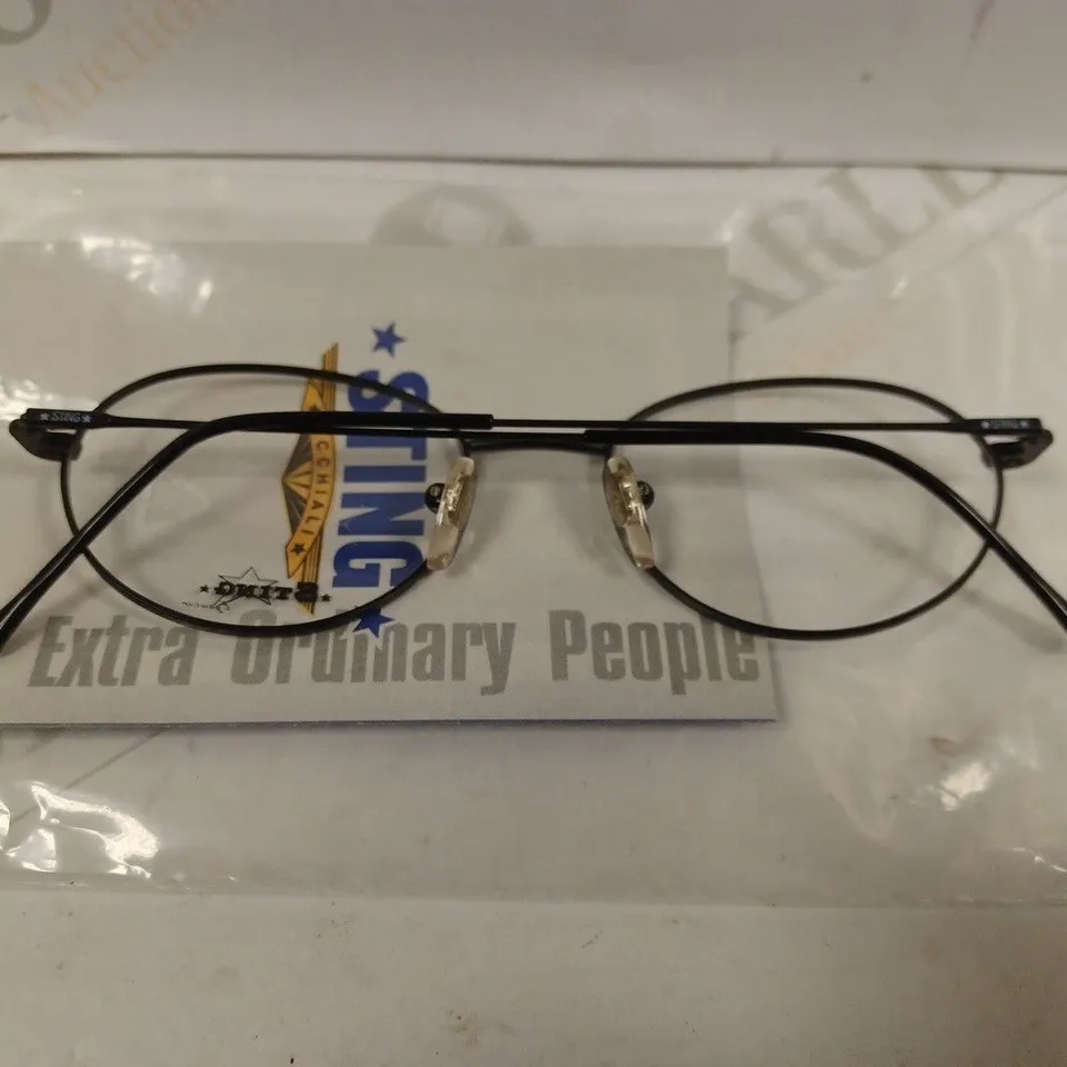 BOX OF APPROX 10 PAIRS OF STING 4319 BLACK ROUND GLASSES 