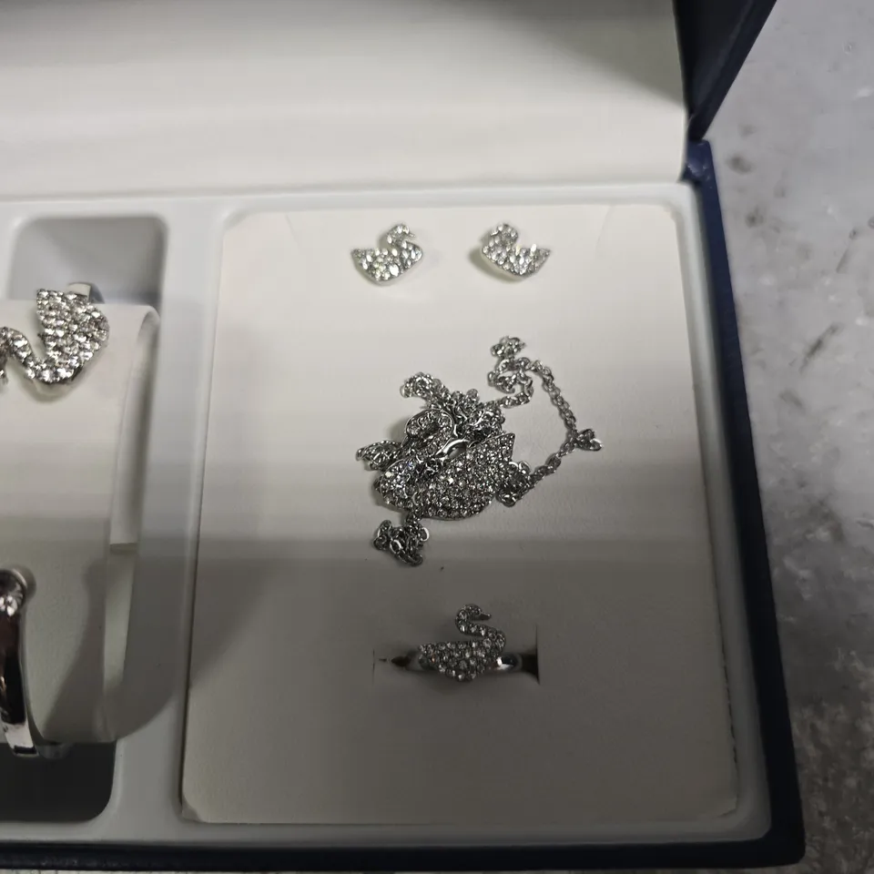 BOXED SWAROVSKI GIFT SET BOX TO INCLUDE - NAVY WATCH , EARRINGS , BANGLE ETC