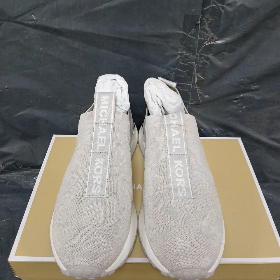 BOXED PAIR OF MICHAEL KORS BODIE SLIP ON TRAINERS - UK SIZE UNSPECIFIED