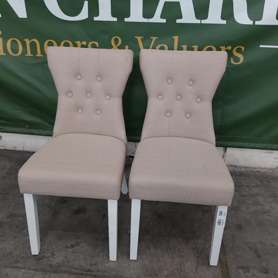 PAIR UPHOLSTERED BUTTONED BACK DINING CHAIRS BEIGE FABRIC ON WHITE PAINTED LEGS 