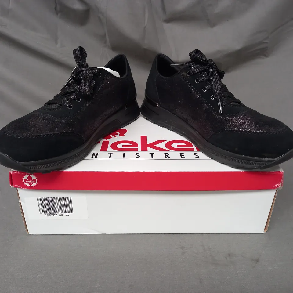 BOXED PAIR OF RIEKER ZIP TRAINERS IN BLACK SIZE 6