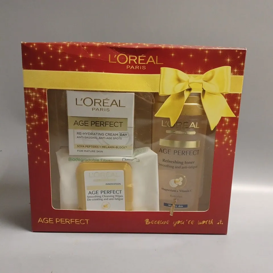 3 BOXED AND SEALED L'OREAL PARIS AGE PERFECT GIFT SET TO INCLUDE CLEANSING WIPES, REFRESHING TONER AND REHYDRATING DAY CREAM