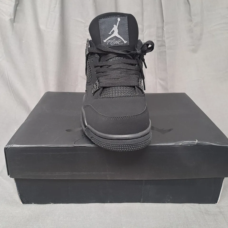 BOXED PAIR OF NIKE AIR JORDAN 4 RETRO SHOES IN BLACK UK SIZE 9