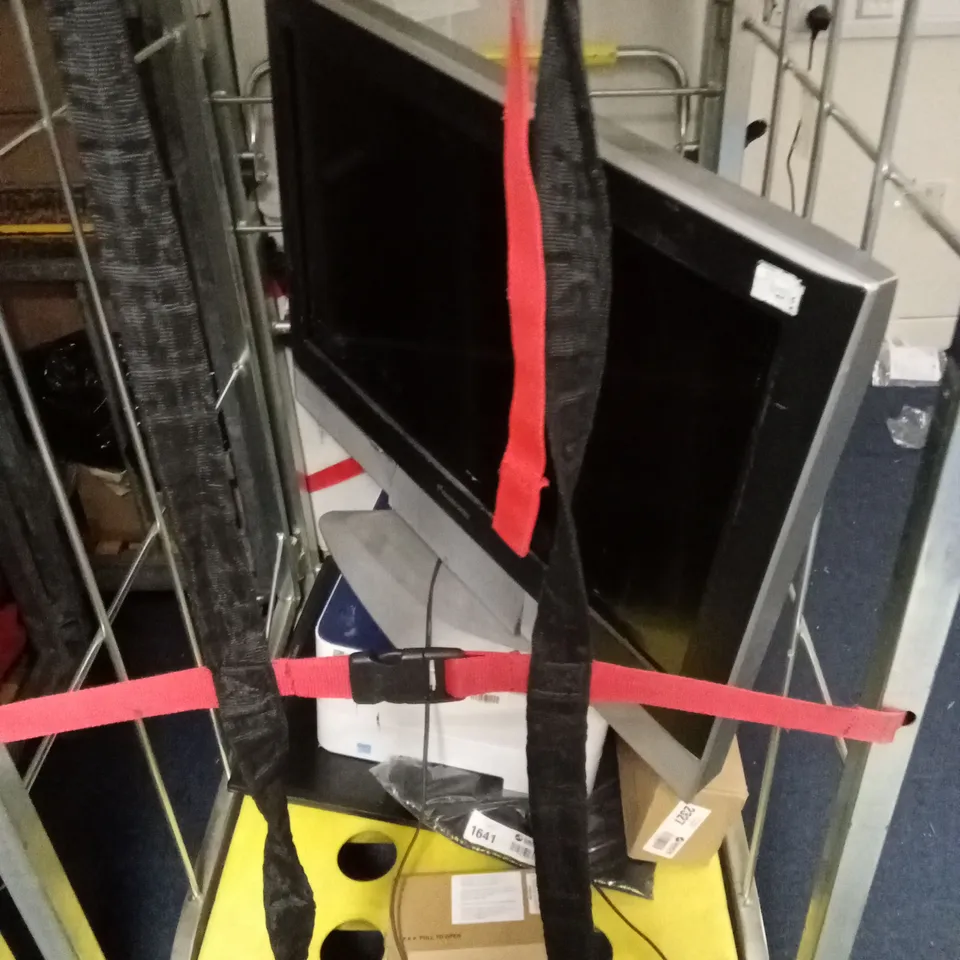 CAGE OF ASSORTED PRODUCTS TO INCLUDE JEAN TROUSERS , PANASONIC TV , ETC 