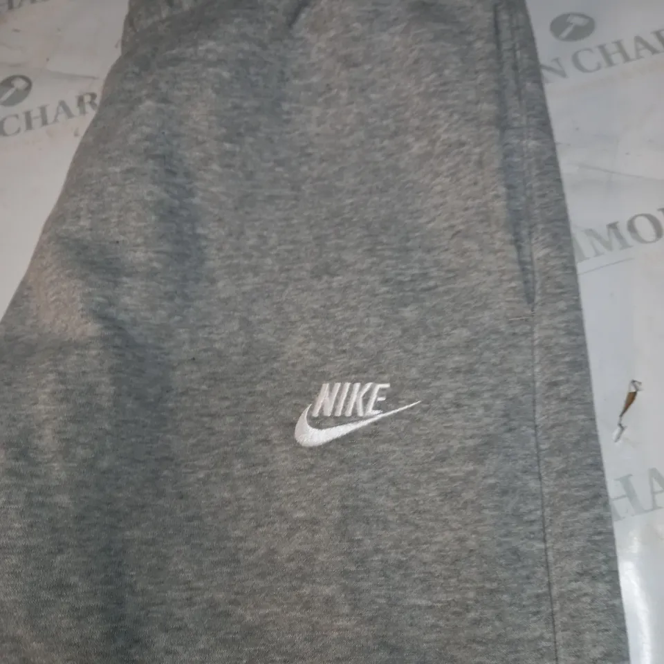 NIKE FLEECED LOGO TRACKSUIT BOTTOMS SIZE M