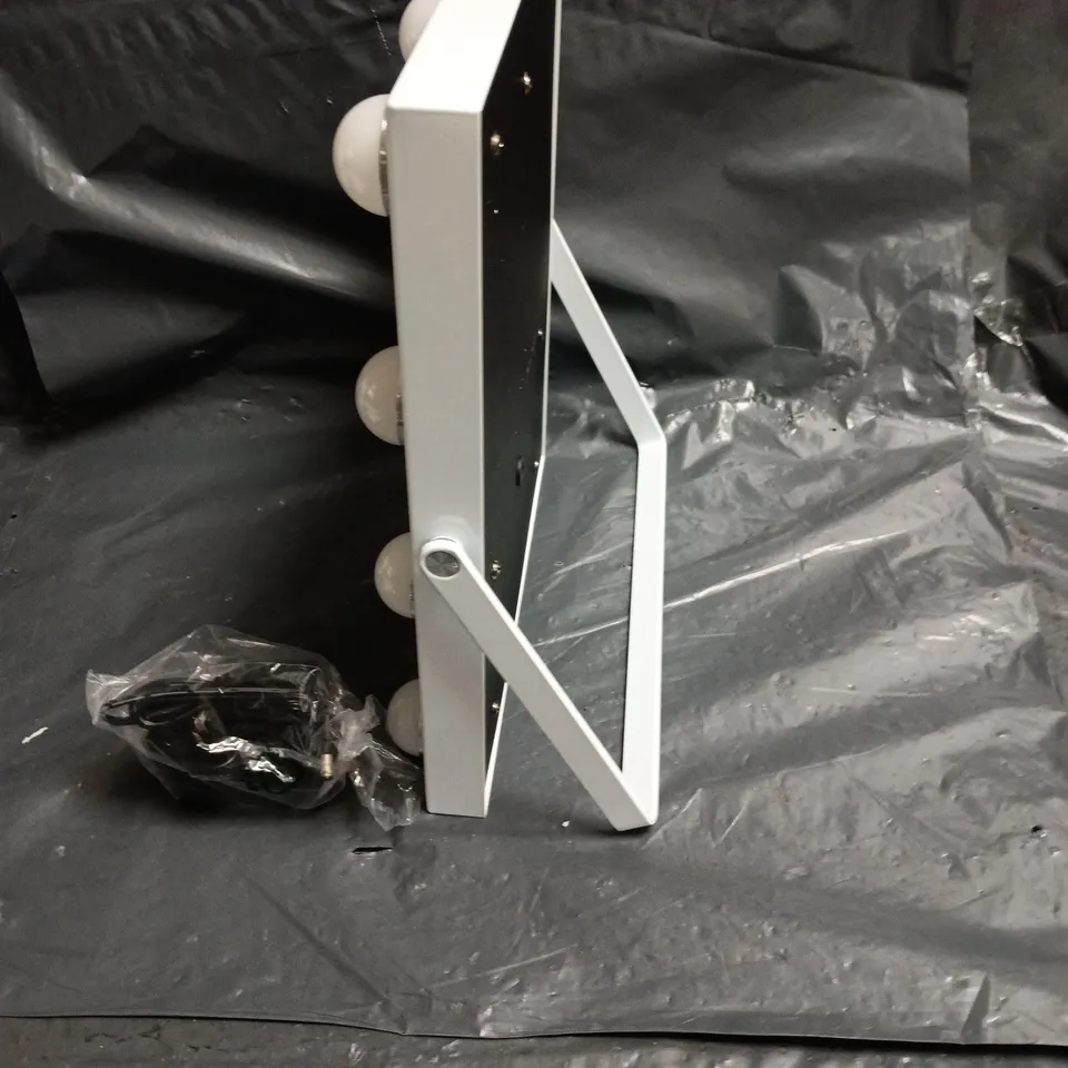 WHITE LIGHTED VANITY MAKEUP MIRROR WITH BULB SURROUND AND FOLD-OUT STAND WITH PLUG