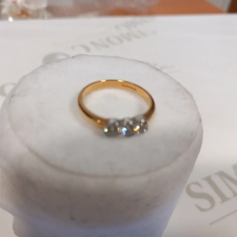 DESIGNER 18CT GOLD THREE STONE RING SET WITH DIAMONDS WEIGHING +0.50CT