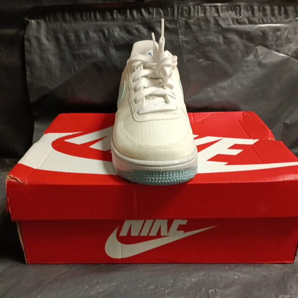 BOXED PAIR OF NIKE AIR SHOES IN CREAM/LIGHT BLUE SIZE UK 4
