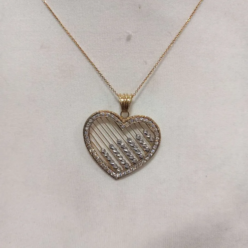 18CT GOLD HEART SHAPED PENDANT ON CHAIN, SET WITH NATURAL DIAMONDS