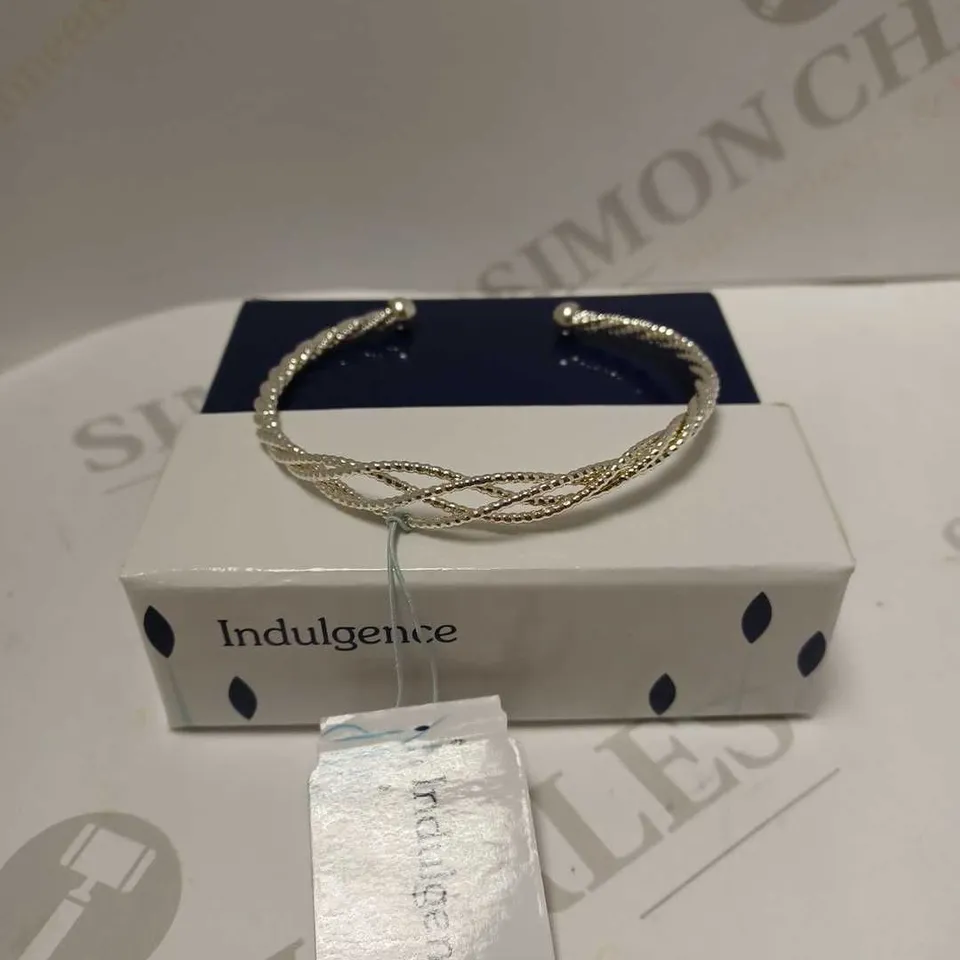 INDULGENCE SILVER TWIST BANGLE 