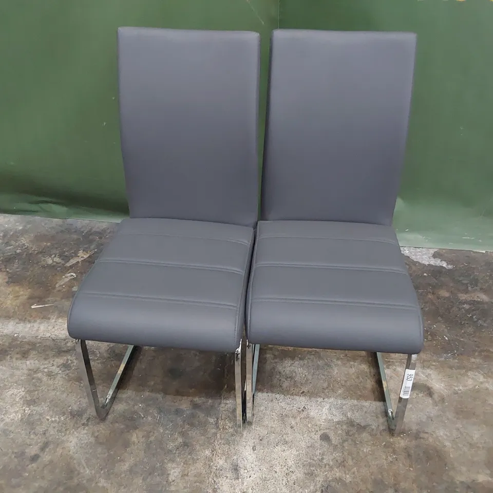 PAIR UPHOLSTERED DINING CHAIRS CHARCOAL PU ON CHROME FRAMES 