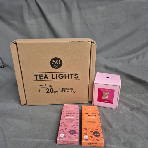 TOTE OF APPROXIMATELY 15 CANDLES AND WAX MELTS. SCENTED AND UNSCENTED